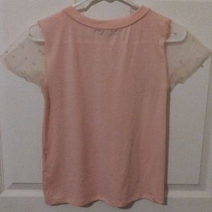 Pin T with see threw sleeves